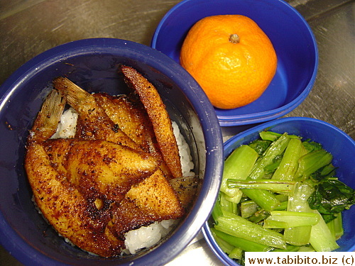 Cajun fish, stirfried veggies, mandarin