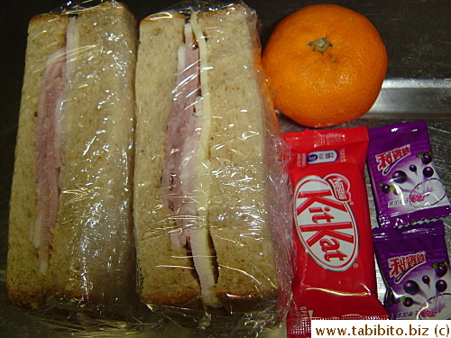 Ham and cheese sandwich, mandarin, KitKat, Ribena candies