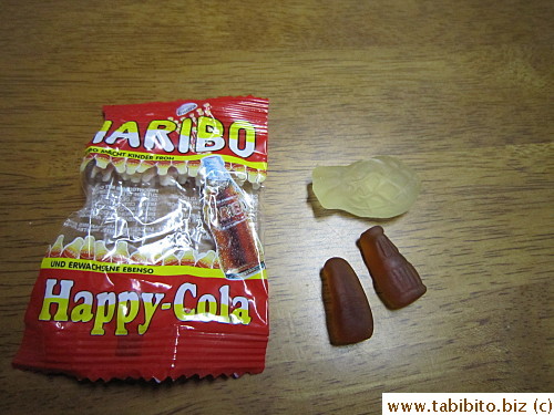 An odd pineapple candy in the Haribo Cola candies