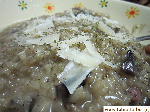 Shaved Parmesan over risotto