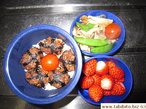 Fried meatballs, stirfried mushrooms and sugar snap peas, cherry tomatoes, strawberries