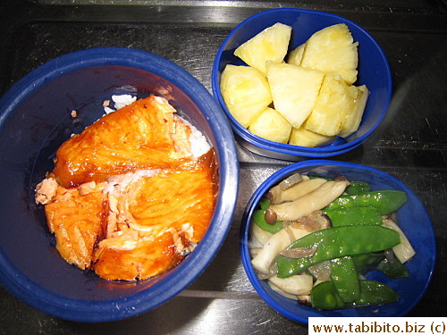 Grilled salmon, sauteed mushrooms and snow peas, pineapple