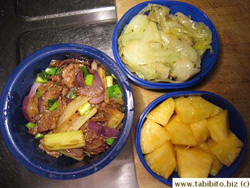 Stirfried beef with onion and celery, sauteed lettuce, pineapple