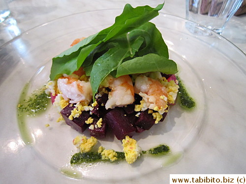 Fresh beets and shrimp salad with pesto dressing