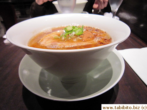 Ramen is presented in a stylish bowl