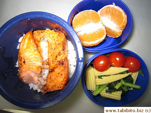Grilled salmon, sauteed spinach and baby corn, cherry tomatoes, tangerine