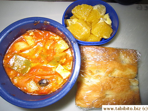 Vegetable stew, focaccia, orange