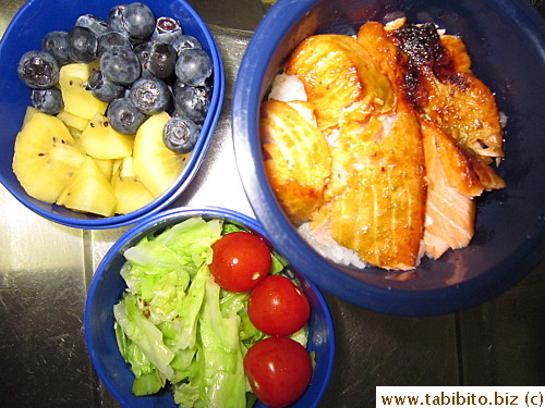 Grilled salmon, sauteed cabbage, cherry tomatoes, kiwi, blueberries