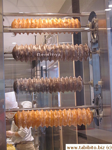 Baumkuchen is made on rotating rods