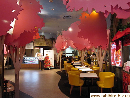 Pink cardboard trees make up the 