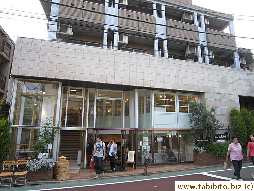 An interior design shop (forget its name) on left and Three Dog Bakery (pet shop) on right (same street as Wachi-Field)