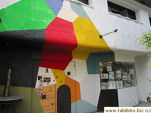 Colorful shop next door to the eyeglasses shop