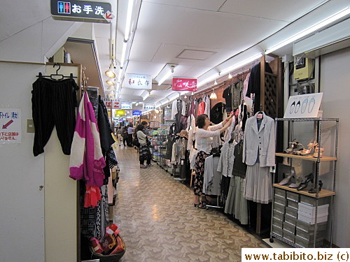 Inside is a number of small stores such as clothing shops