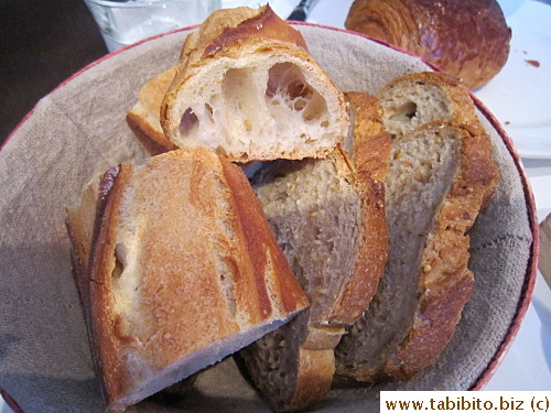 Basket of baguette and multigrain bread