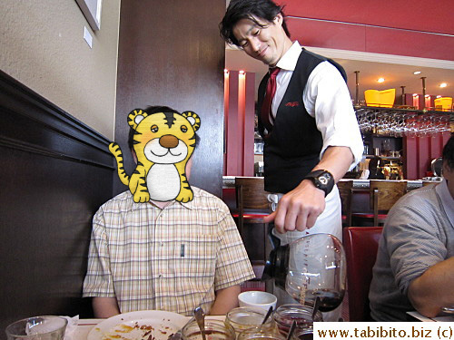 A very happy server, and they don't even work for tips. Their professionalism is admirable