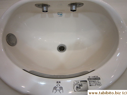 You don't see a built-in hand dryer in a sink very often