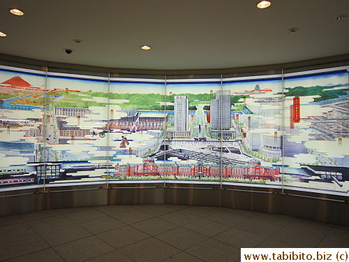 This lit mural in the underground passage tells the history of Marunouchi