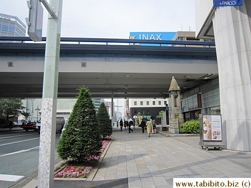 after passing under it