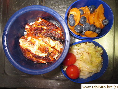 Cajun salmon, sauteed cabbage, cherry tomatoes, biwa and blueberries