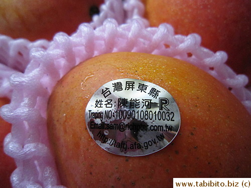 The sticker bears the grower's name and the place of origin 