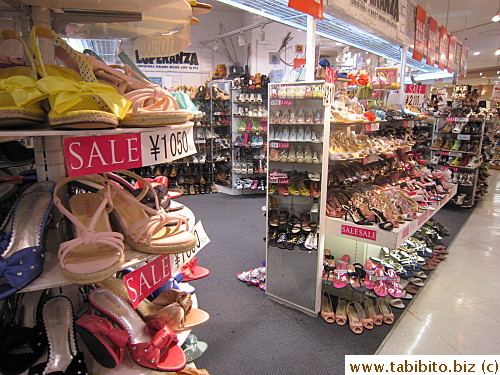 lots of shoe stores can be found on the first floor