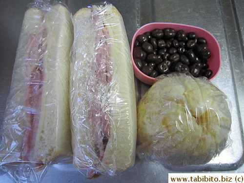 Ham and cheese sandwich, orange, chocolate