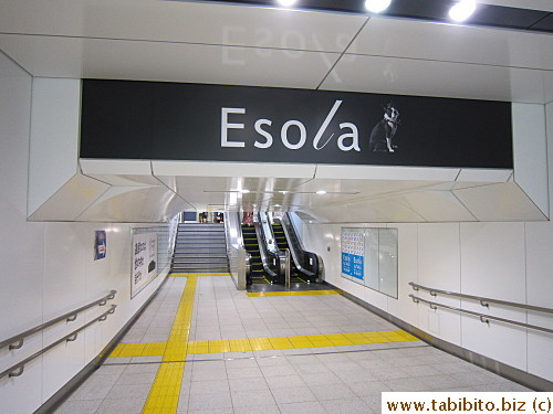 Up two very short escalators
