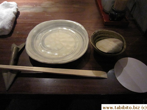 Place setting (the big clam shell is for scraping meat from the tuna backbone)