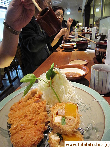 Pouring dressing over cabbage