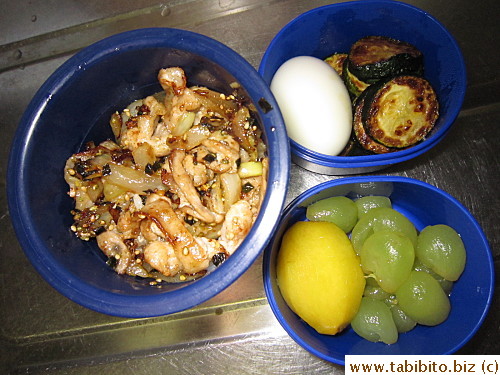 Sauteed pork, zucchini, soft-boiled egg, plum and grapes