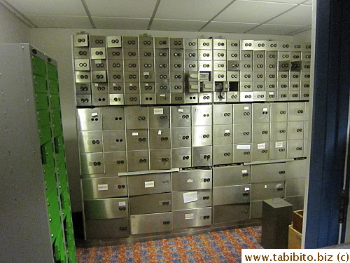 The safe in Holiday Inn operates just like the bank vault. A staff and KL both had to sign and unlock the safe when he retrieved the content each time, and the staff locked it again and sealed the outside safe door with a plastic tie
