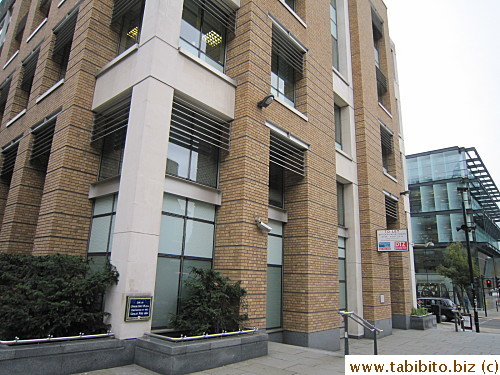 What's the significance of this building further down the road?