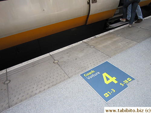 The car number is posted on the platform floor