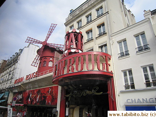 Back on the bus, we drove past famous Moulin Rouge