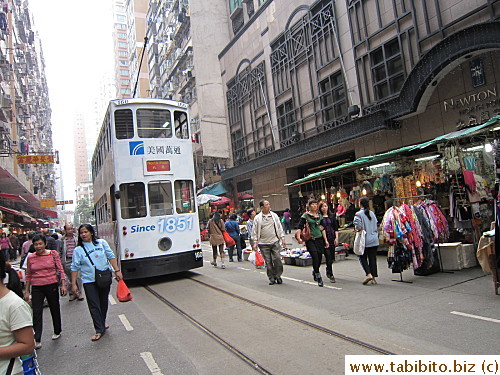 Shoppers are not fazed by oncoming trams