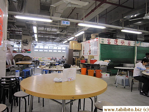 Typical setting of cooked food stalls in wet markets