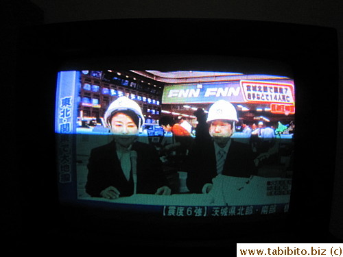 On March eleventh anchors on Channel 8 report the news wearing helmets