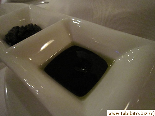 Balsamic vinegar was reduced to a syrupy dip topped with olive oil