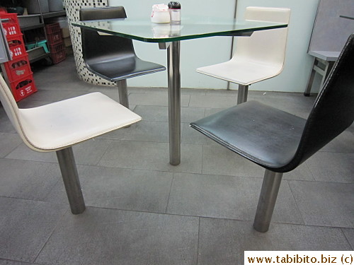 The chairs are mounted on the floor! (Fat people like me have a hard time squeezing into the seat...)