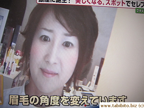 and the reporter's reflection gets INSTANT made up! It can even change the angle of the eye brow
