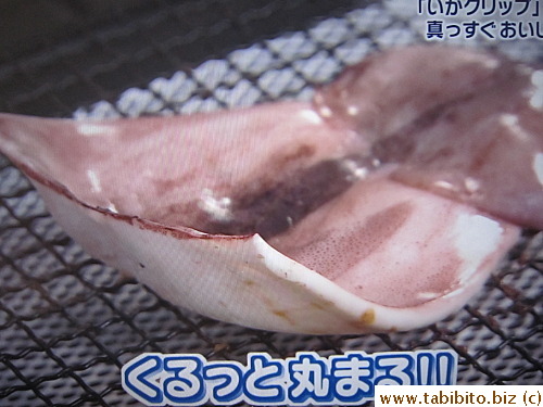 To prevent the squid from curling when grilling