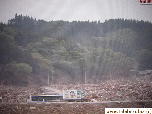 Everyday the truck drives through rubble to reach the residents