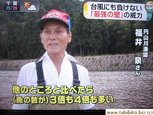 This fisherman says the number of fish in the river grew because of the wall which also protects the river from typhoon