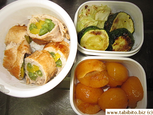 Pork and vegetable rolls, sauteed zucchini, cabbage, plum