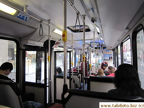 The presence of multiple security cameras and monitors inside begs the question of safety on the bus