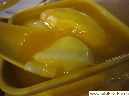 with half a mango cheek