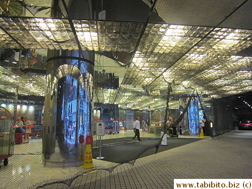 The hotel put up a giant net cover at the entrance during the Signal 8 typhoon