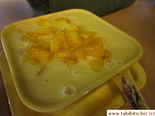 Tofu-fa in mango sauce with chopped mango