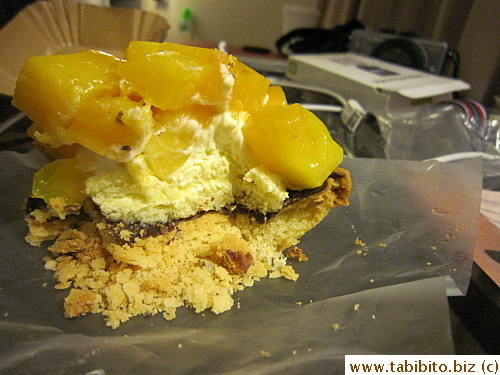 Fresh mango, cream, sponge cake, chocolate, flaky pastry equals delicious