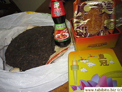 Mom gave me some sort of tea leaves and a mooncake and Sophia gave me a bottle of spicy sauce to bring home